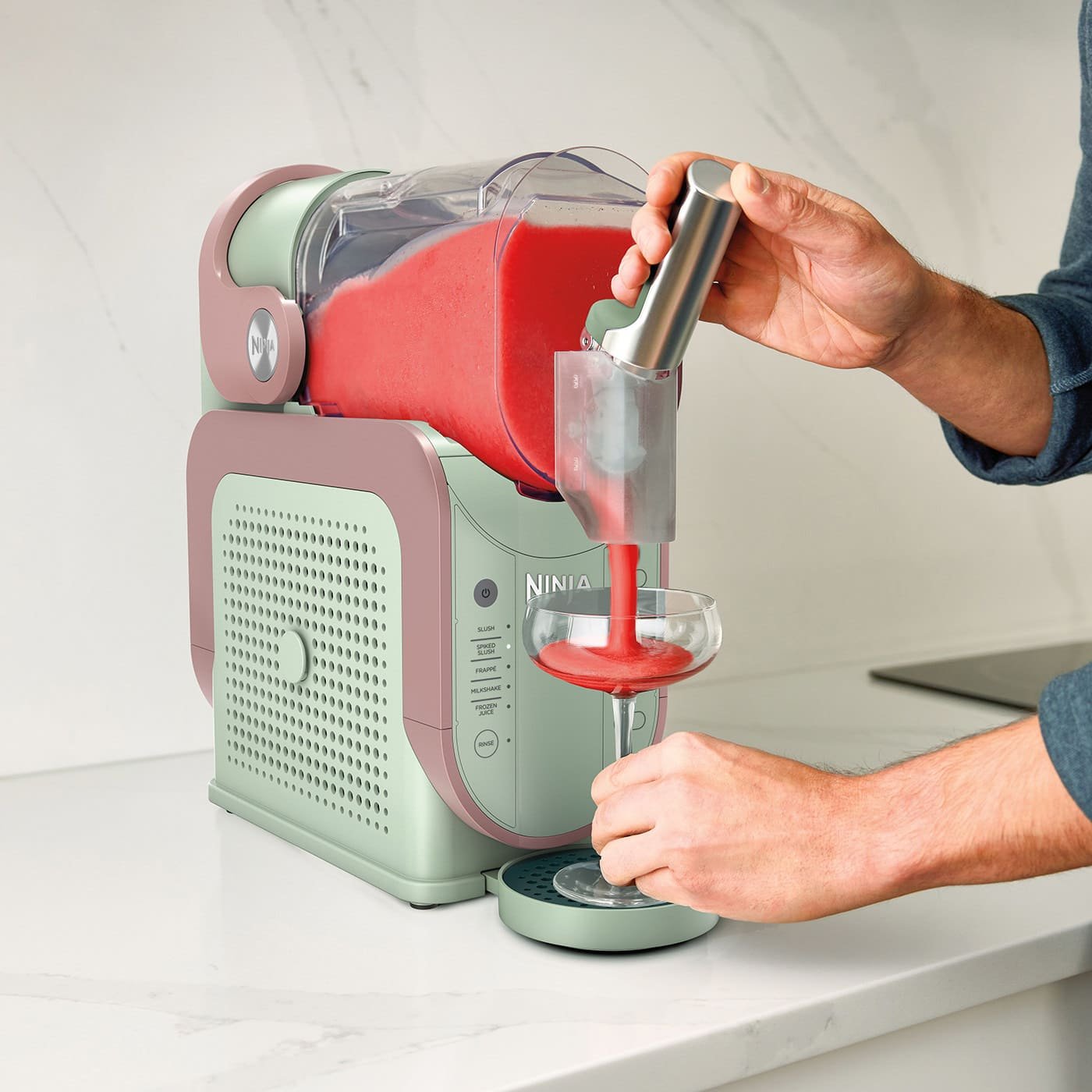 Ninja-FS301UKMTPK-InUse-Kitchen-OnCounter-Dispensing-Man-Strawberry-2